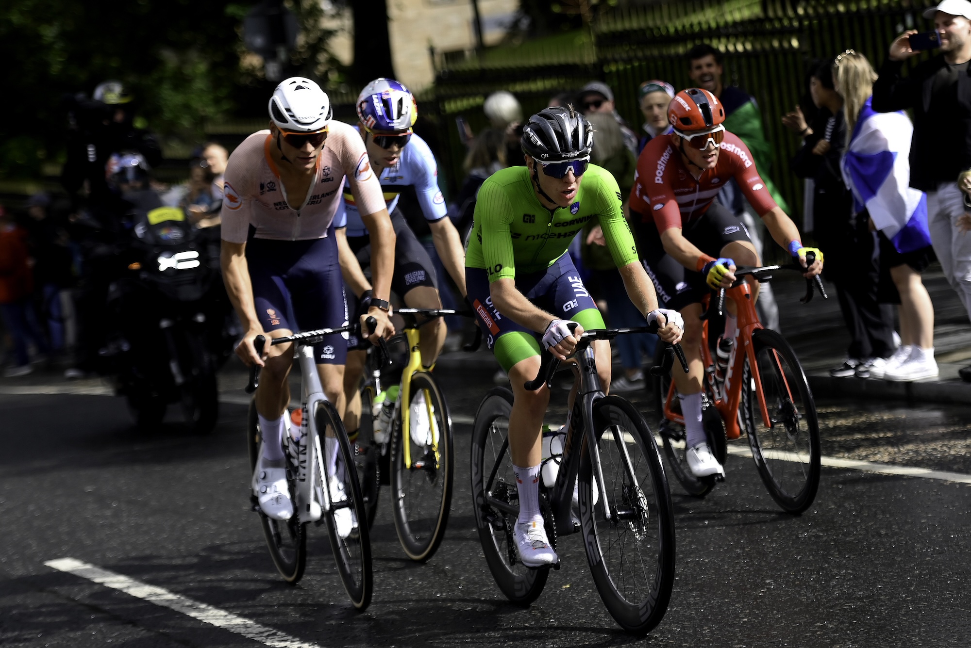 GLASGOW, SCOTLAND - AUGUST 06: (L-R) Mathieu Van Der Poel of The Netherlands, Wout Van Aert of Belgium, Tadej Pogacar of Slovenia and Mads Pedersen of Denmark compete in the breakaway during the 96th UCI Cycling World Championships Glasgow 2023, Men Elite Road Race a 271.1km one day race from Edinburgh to Glasgow / #UCIWT / on August 06, 2023 in Glasgow, Scotland. (Photo by Alex Broadway UCI - Pool/Getty Images)