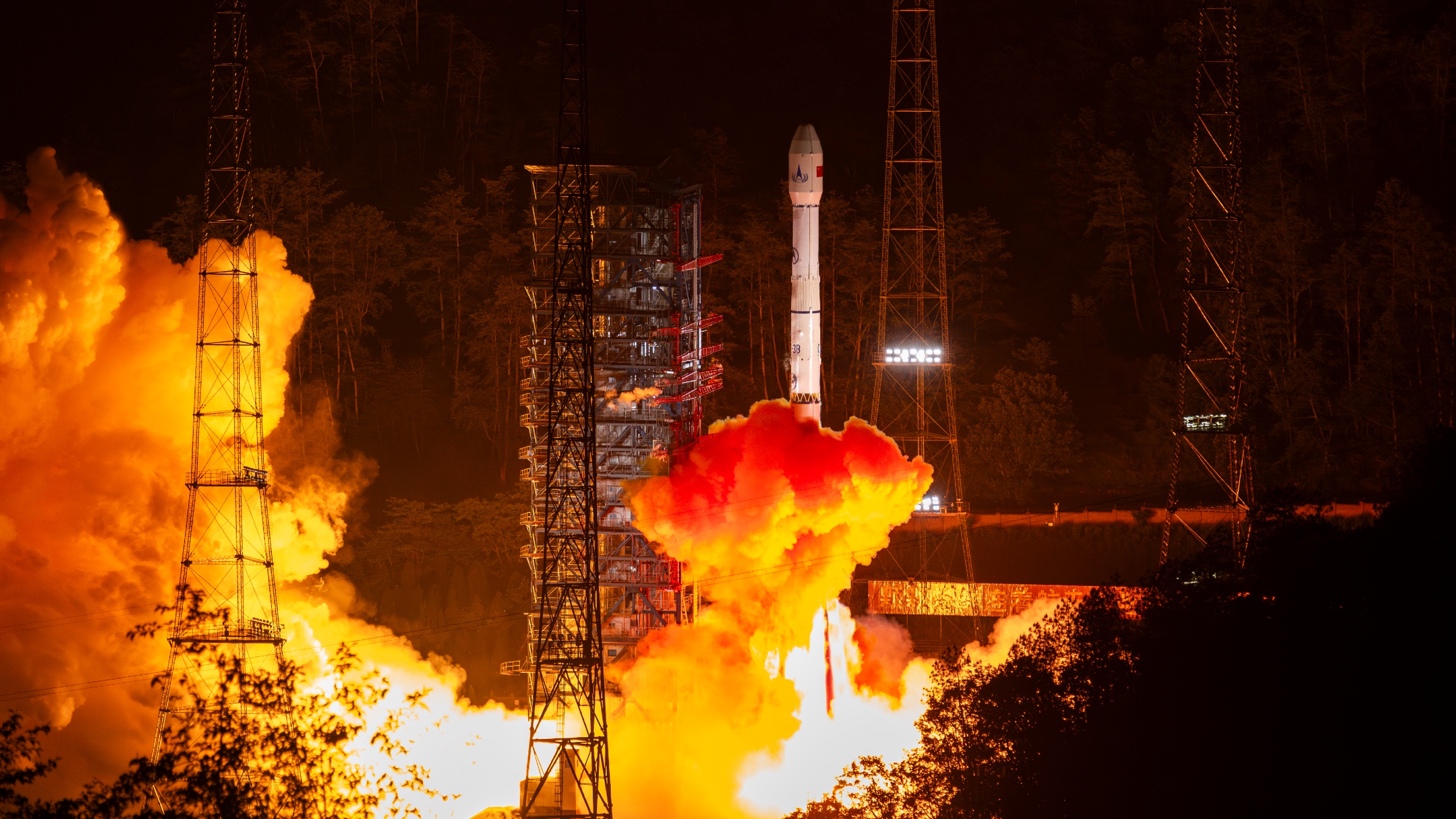 Photo of a Chinese rocket taking off at night