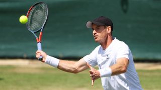 Andy Murray of Great Britian plays a forehand during a practice session ahead of The Championships Wimbledon 2022