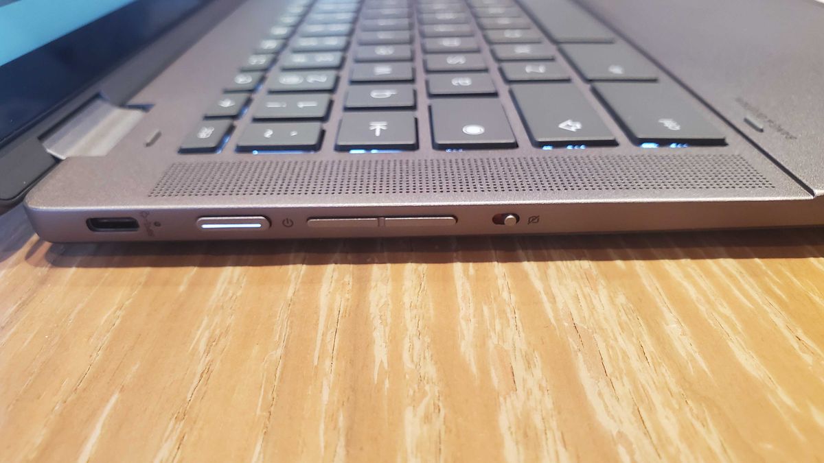 Chromebook Plus laptop on wooden table