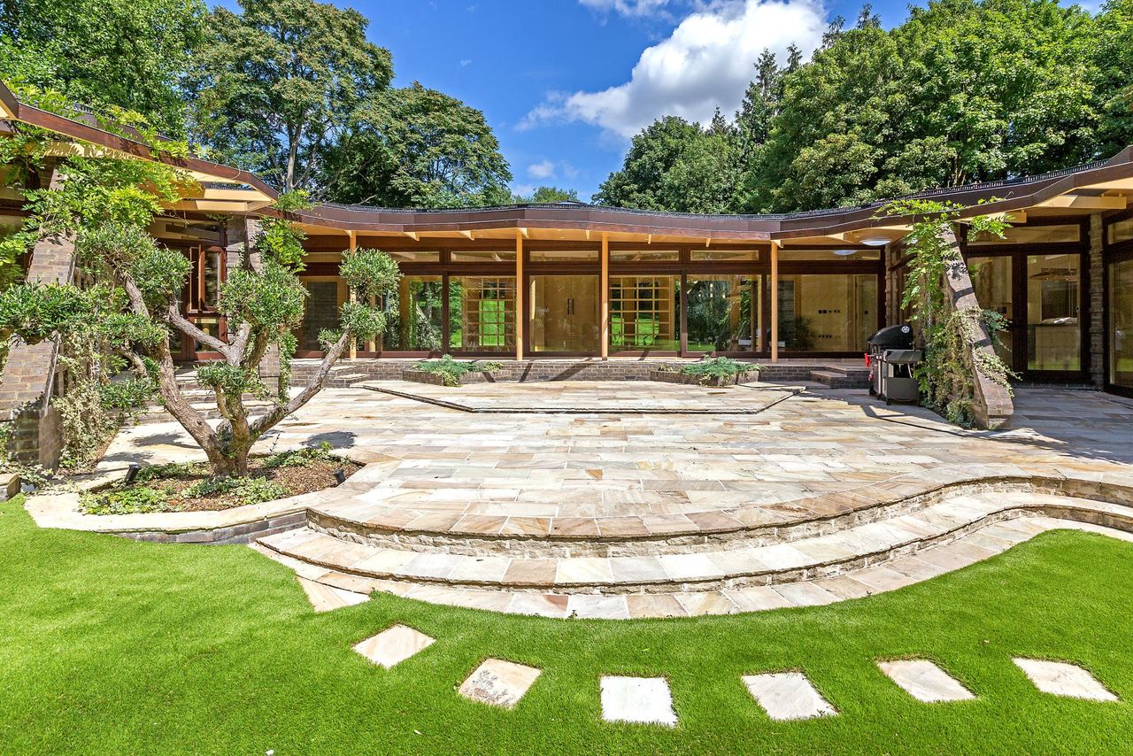A view of the patio in the garden from outside the home