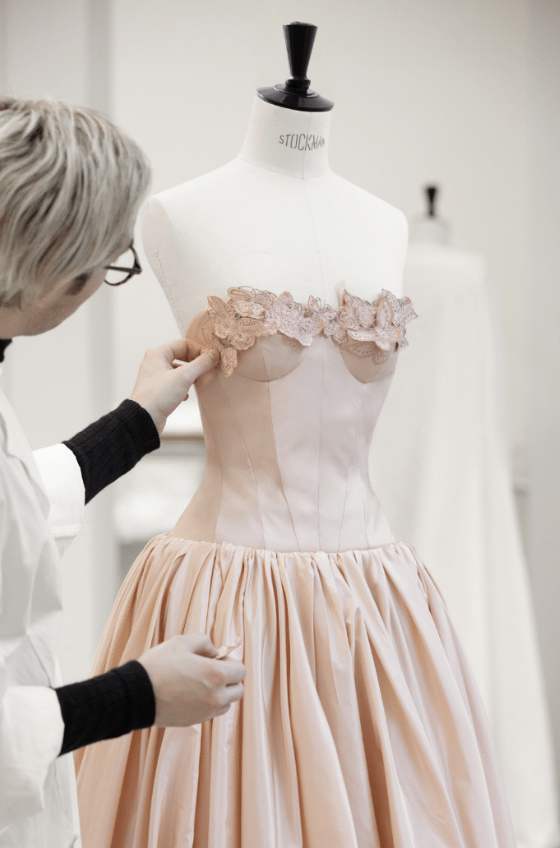 a behind the scenes look at rachel zegler's snow white premiere dress by dior