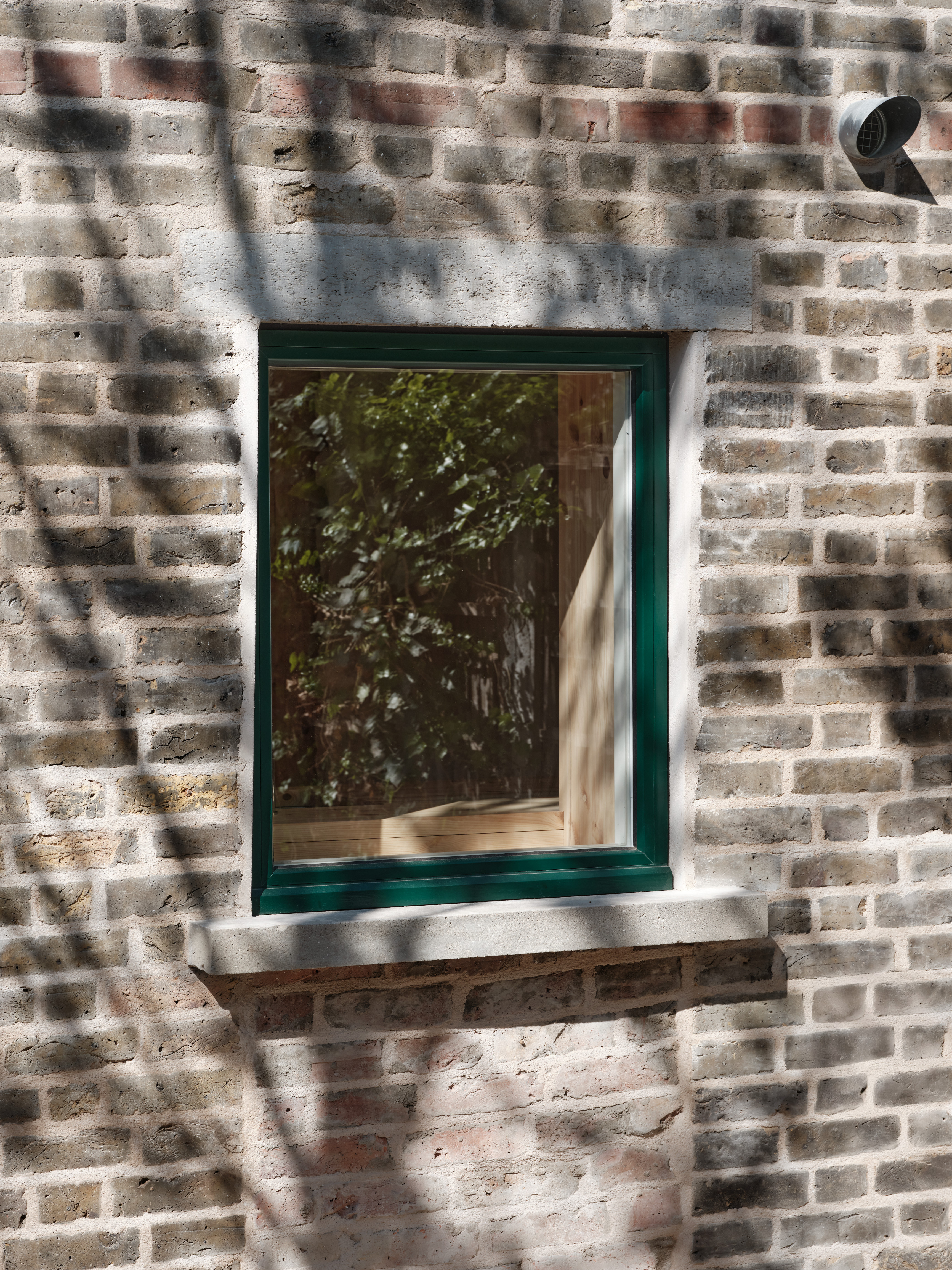 Exterior brickwork has been restored and windows replaced