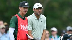 Ted Scott and Scottie Scheffler in conversation during the fourth round of the Tour Championship