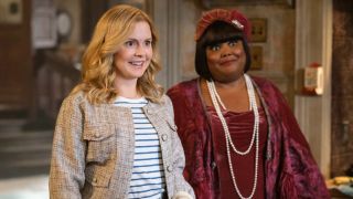 Pictured (L-R): Rose McIver as Sam smiling and Danielle Pinnock as Alberta standing behind her almost smiling.