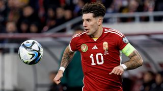 Dominik Szoboszlai of Hungary controls the ball during the UEFA EURO 2024 qualifying round group B match between Hungary and Bulgaria at Puskas Arena on March 27, 2023 in Budapest, Hungary.