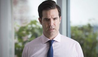 Catastrophe Rob Delaney looking freaked out in the middle of an office