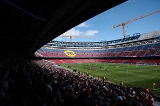 BARCELONA, SPAIN - NOVEMBER 07: Fans of FC Barcelona follows the training session during their first FC Barcelona open training session at Spotify Camp Nou. 23,000 fans will watch Barcelona play during a sold-out open door training session at the new Spotify Camp Nou today, as the stadium reopens following it's closure for refurbishment on May 28, 2023, on November 07, 2025 in Barcelona, Spain. (Photo by Eric Alonso/Getty Images)