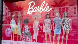 Barbies in a shop window