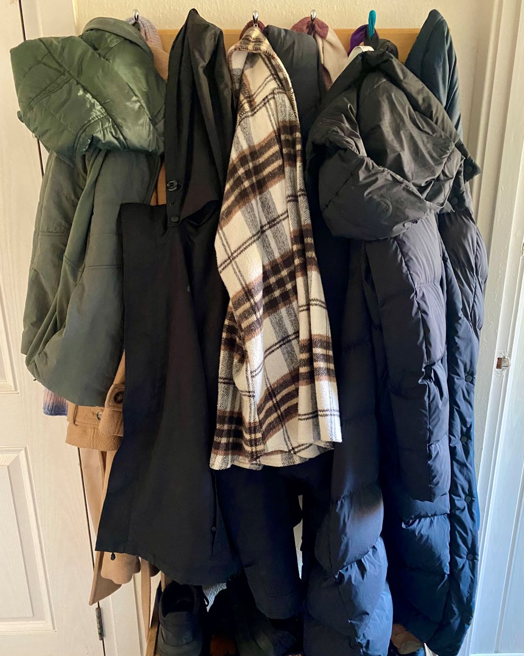 coats hung up in hallway