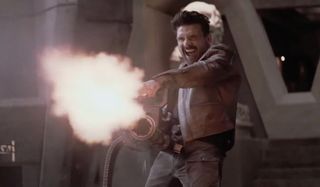Boss Level Frank Grillo is really happy with his gatling gun