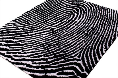 A personalized rug that replicates thumbprints of the actual consumers.