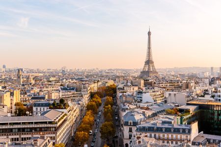 Paris skyline with Eiffel Tower at sunset