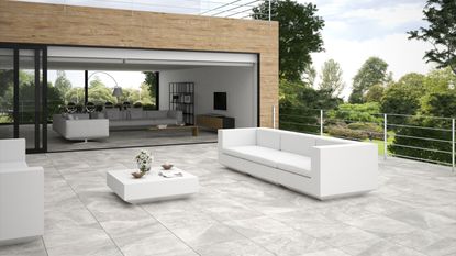 modern patio with light colored paving tiles