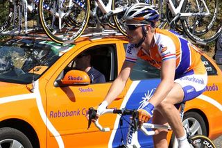 Lars Boom (Rabobank) by the team car.