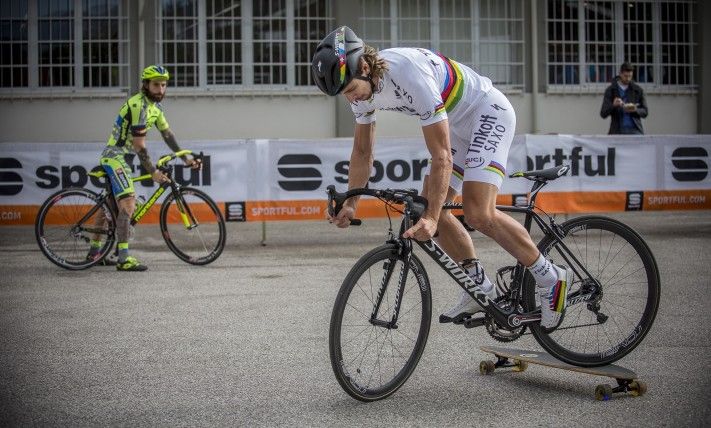 Peter Sagan plays around with a skateboard