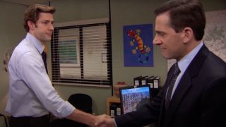 John Krasinski and Steve Carell shaking hands in The Office