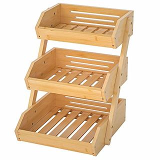 Bamboo slatted three-tier Organizer with biggest one on the bottom, going up to a smaller size.