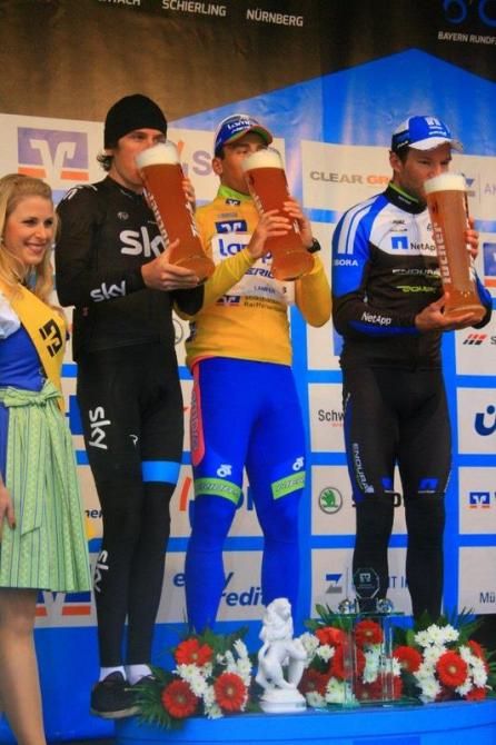 Bottoms-up for the overall classification podium: Thomas, Malori and Barta