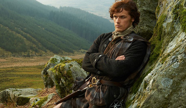 jamie fraser with arms crossed outlander