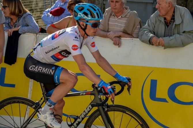 Tom Jelte Slagter (Garmin Sharp) finishes stage 6 on a spare bike after he suffered a mechanical with his rear derailleur on the climb to the finish