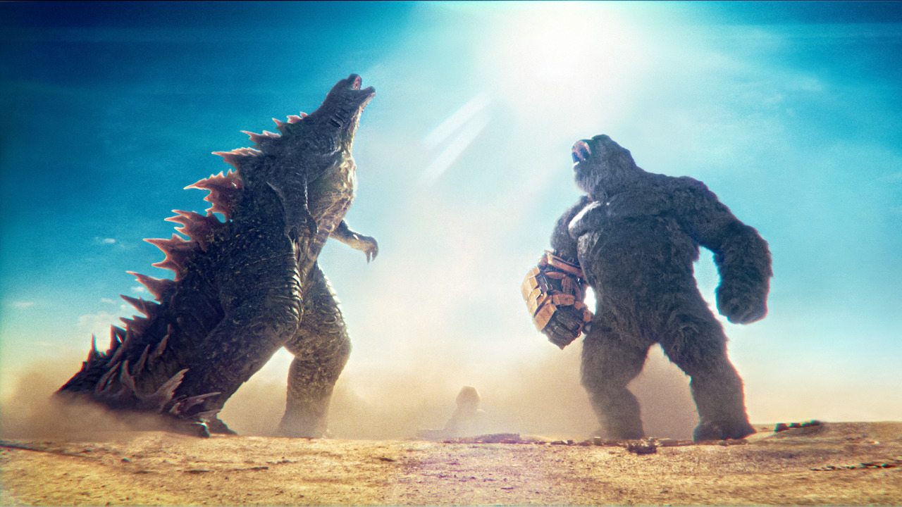 Godzilla and Kong roaring in desert in The New Empire