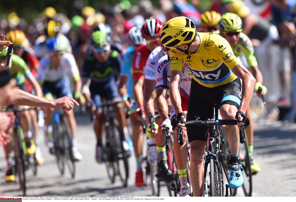 Chris Froome checks on his rivals