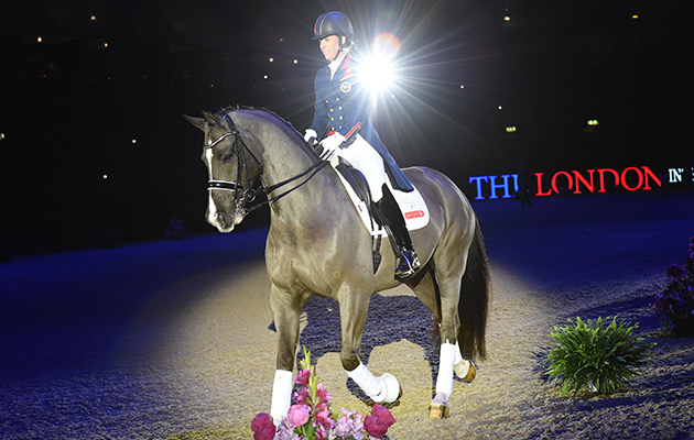 Valegro pricks his ears as he trots round the arena