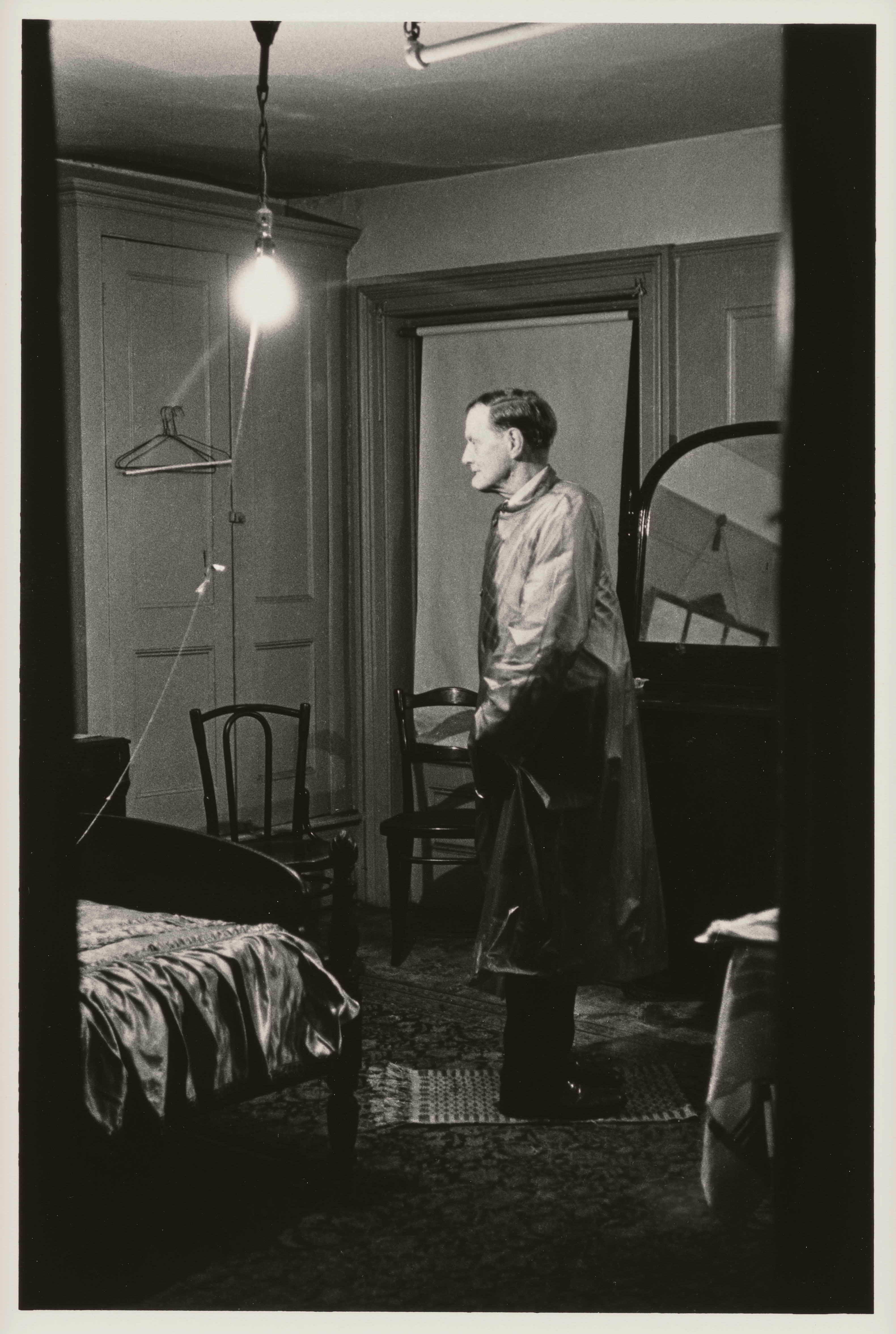 Diane Arbus, The Backwards Man in his hotel room, N.Y.C. 1961