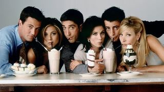 The friends cast all drinking milkshakes in a row