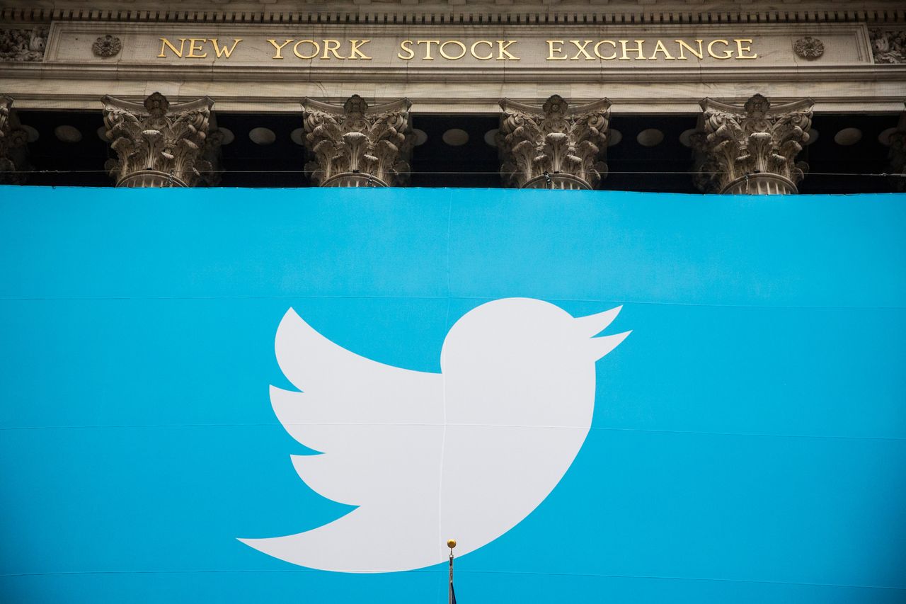 Twitter&amp;#039;s logo flies over the New York Stock Exchange