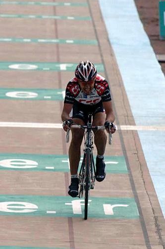 Fabian Cancellara (CSC) gets one lap to go