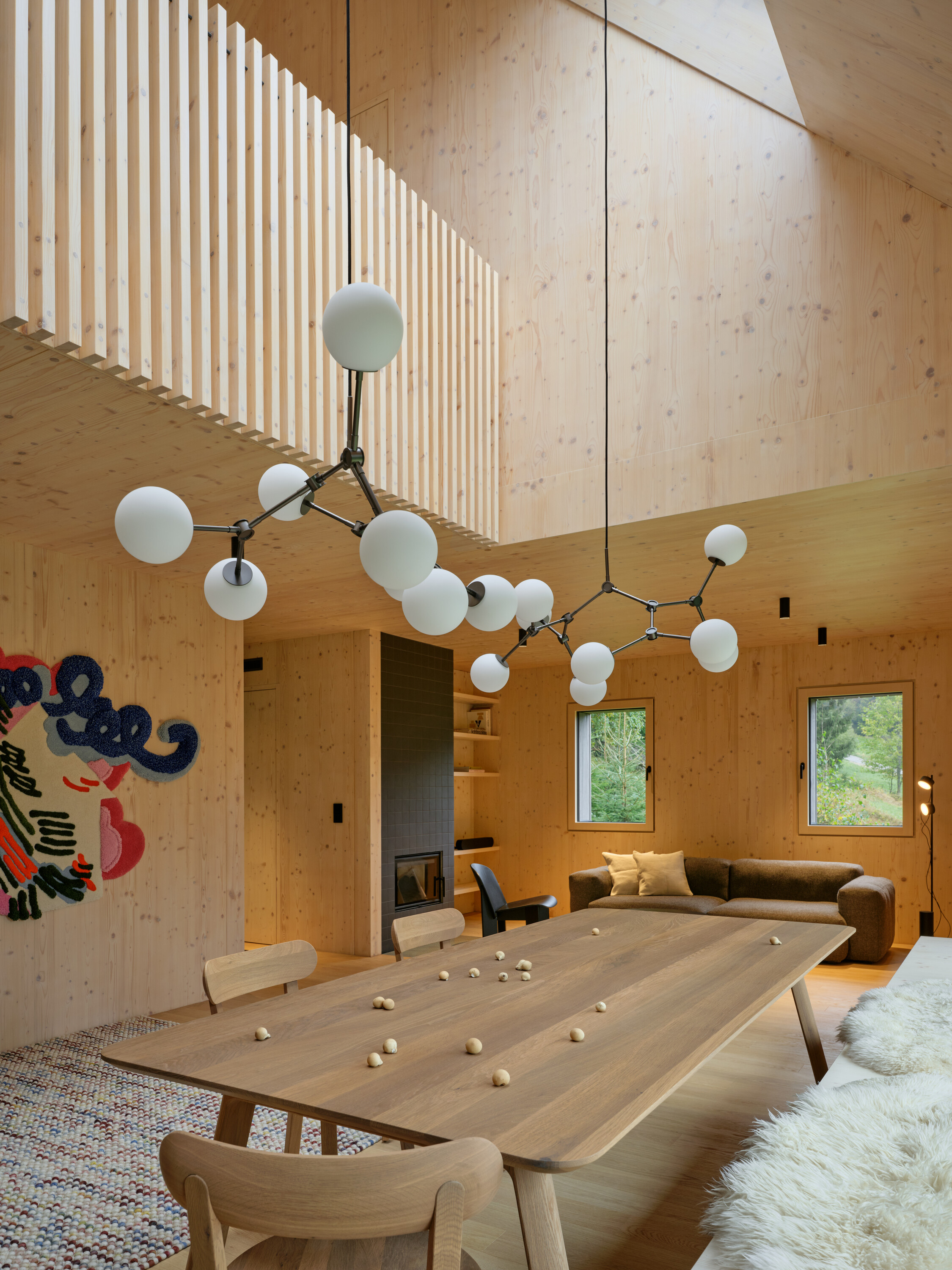 The main living area, with ceilings that extend up to the sloping roof