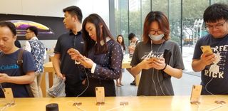 Chinese people at an Apple store