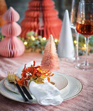 Pink Christmas table setting with pink brush trees