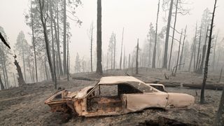 a burnt vehicle is pictured beside a fire ravaged home during the creek fire in auberry, fresno county on september 11, 2020 more than 20,000 firefighters from across the united states on friday battled sprawling deadly wildfires up and down the west coast a wave of infernos that have forced more than half a million people to flee their homes photo by frederic j brown afp photo by frederic j brownafp via getty images