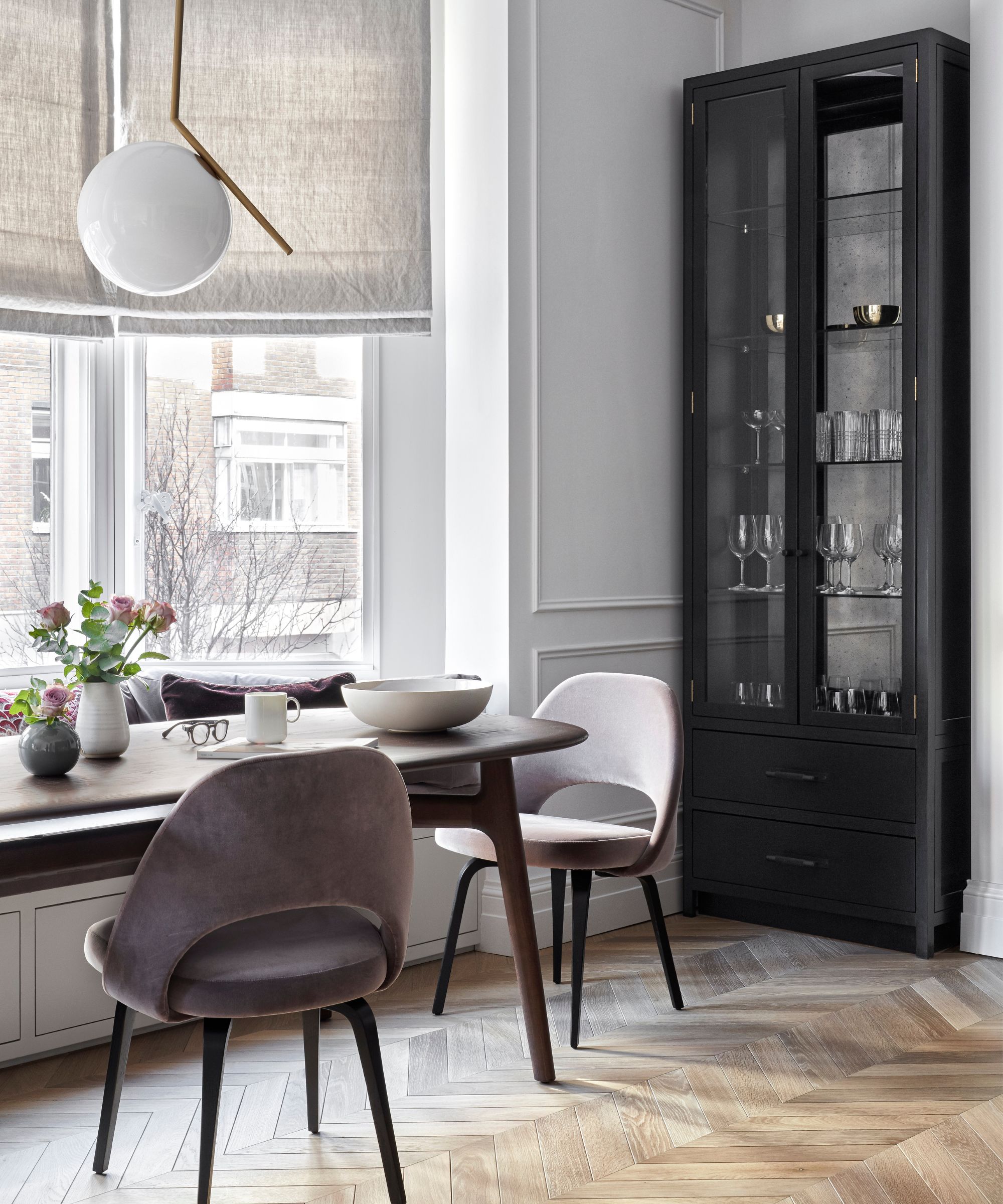 monochrome breakfast room with large bay window
