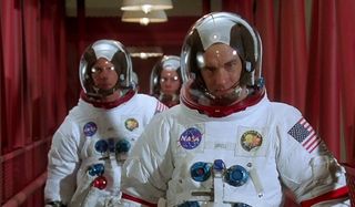 Apollo 13 Kevin Bacon Bill Paxton and Tom Hanks are suited up, walking to the space capsule