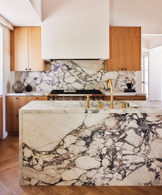 wooden kitchen marble wrapped island