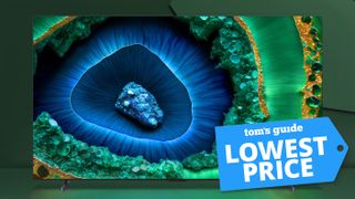 TCL C855 QD Mini LED TV product image with Tom&#039;s Guide &#039;Lowest Price&#039; deal badge layered on top.