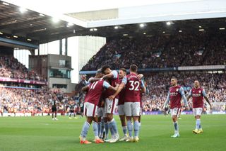 Ollie Watkins of Aston Villa celebrates with teammates after scoring their team's fourth goal during the Premier League match between Aston Villa and Brentford FC at Villa Park on October 23, 2022 in Birmingham, England.