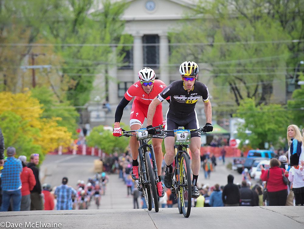 Derek Zandstra (Scott 3Rox Racing) and Todd Wells (Specialized) attempt to chase down DeJong on lap four