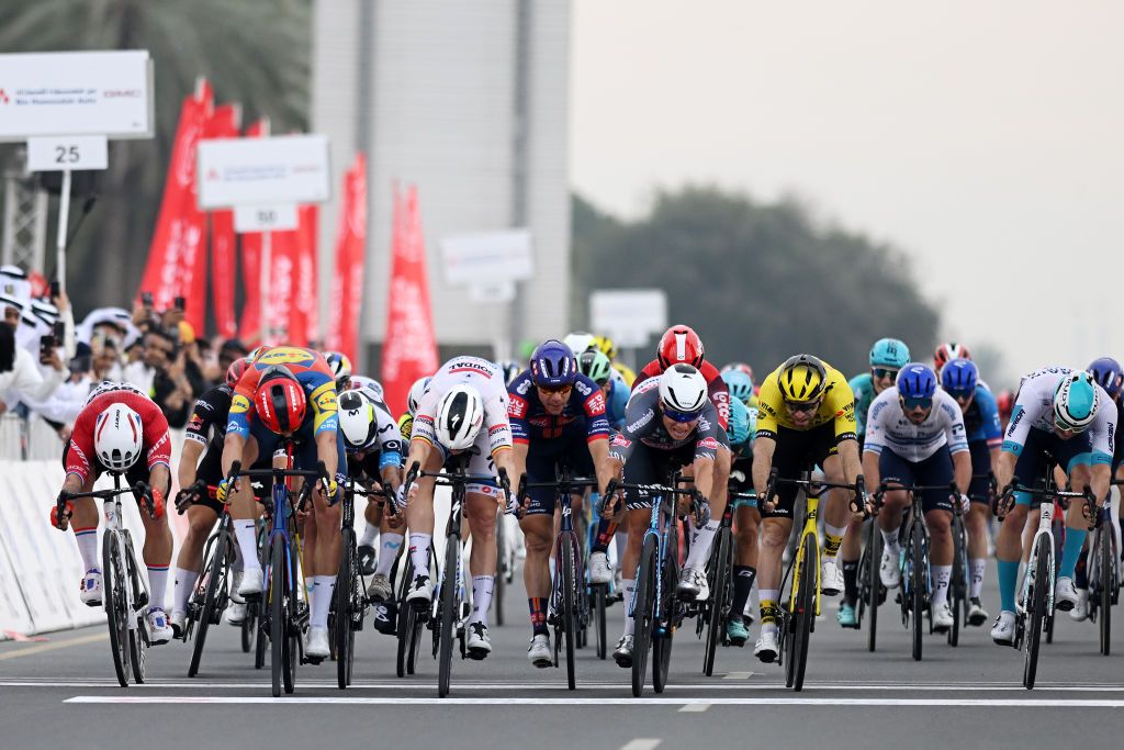 QIDFA UNITED ARAB EMIRATES FEBRUARY 20 LR Dylan Groenewegen of The Netherlands and Team Jayco AlUla Jonathan Milan of Italy and Team LidlTre Tim Merlier of Belgium and Team Soudal QuickSte Fabio Jakobsen of The Netherlands and Team Picnic PostNL Jasper Philipsen of Belgium and Team AlpecinDeceuninck Daniel McLay of The United Kingdom and Team Visma Lease a Bike and Phil Bauhaus of Germany and Team Bahrain Victorious sprint at finish line during the 7th UAE Tour 2025 Stage 4 a 181km stage from Fujairah Qidfa Beach to Umm al Quwain UCIWWT on February 20 2025 in Fujairah Qidfa Beach United Arab Emirates Photo by Dario BelingheriGetty Images