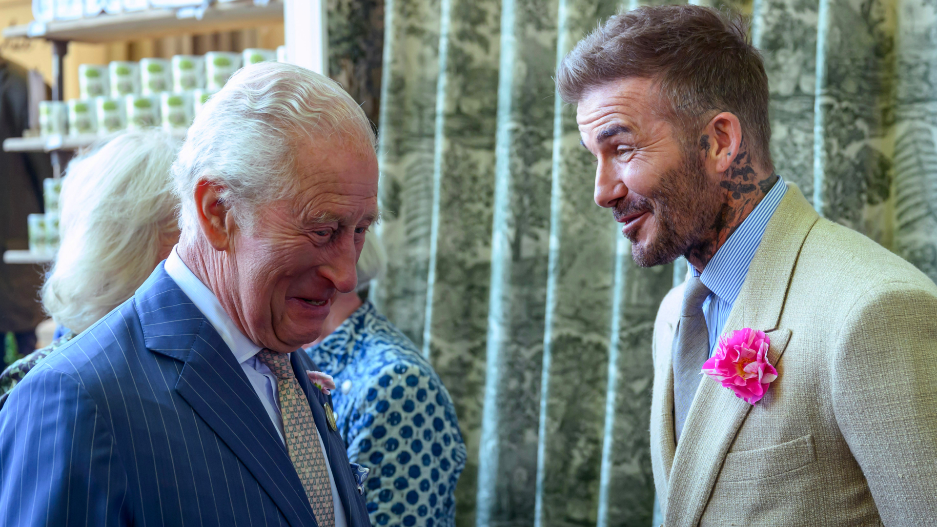 David Beckham talking and laughing to King Charles