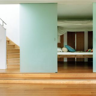 hall way with bedroom and stairs