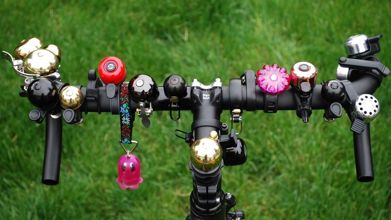 Handlebar with lots of bike bells fitted