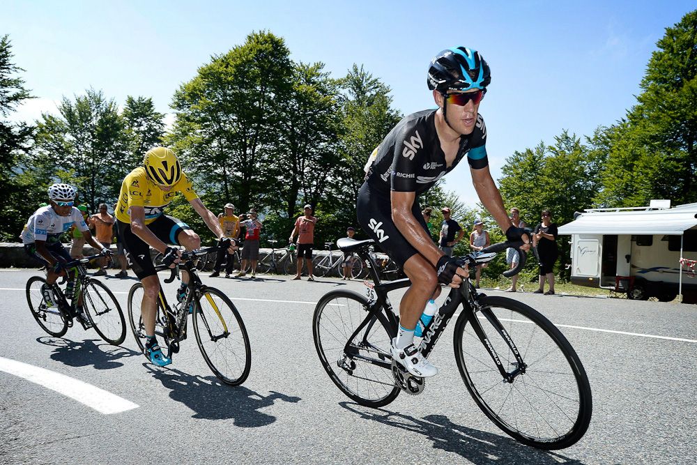 Richie Porte paces Sky team leader Chris Froome.