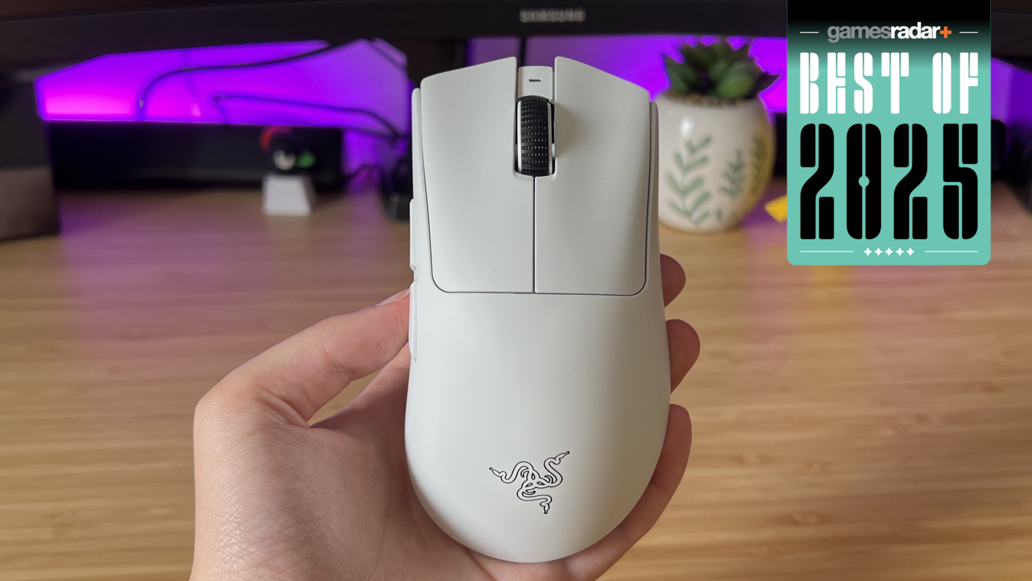 Hand holding the Razer DeathAdder V4 Pro with a GamesRadar+ Best of 2025 badge