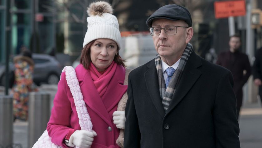 From left to right: Carrie Preston walking right behind Michael Emerson on Elsbeth. 