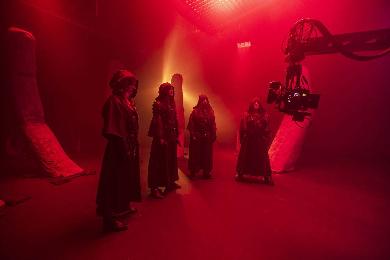 Beast In Black dressed in robes